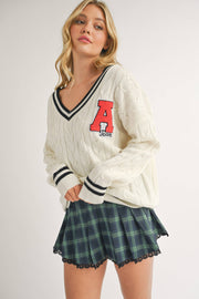 VARSITY PATCH V NECK CABLE KNIT SWEATER