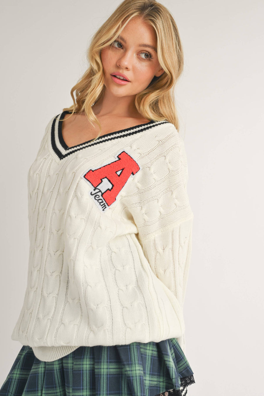 VARSITY PATCH V NECK CABLE KNIT SWEATER