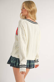 VARSITY PATCH V NECK CABLE KNIT SWEATER